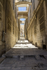 Narrow street of Muslim quarter in old city of Jerusalem.