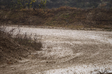 Muddy road in countryside