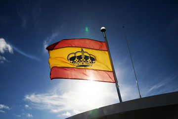 spanish flag on blue sky