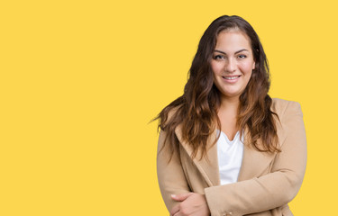 Obraz premium Beautiful plus size young woman wearing winter coat over isolated background happy face smiling with crossed arms looking at the camera. Positive person.