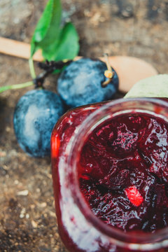 Plum Jam In The Jar On The Stump From Above