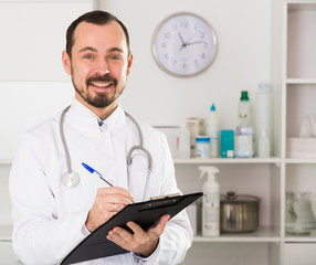 Male doctor waiting for patients