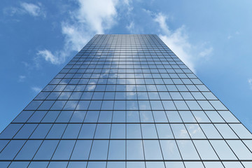 Fototapeta na wymiar Modern skyscraper under blue sky with clouds