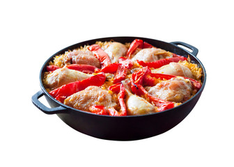Chicken thighs and legs baked over a bed of rice and red bell pepper isolated with clipping path