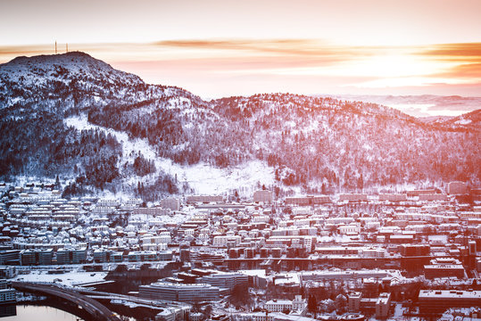Panoramic view from the mountains to Bergen in winter, ccity in the haze, Norway