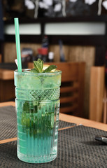 Glass with non-alcoholic mojito in a restaurant