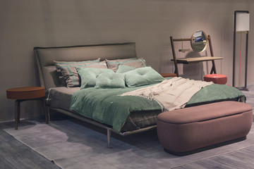 Bed in the bedroom in modern style. Interior