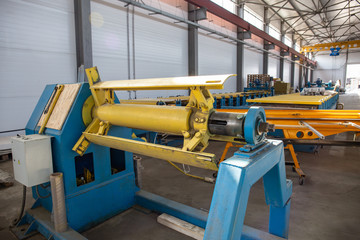 Worksop with machinery tools and equipment, conveyor line for production metal pipes and sandwich...