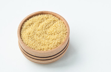 couscous in bowl on white background