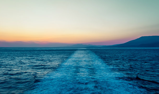 Track from cruise ship at sunset