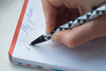 plan for the day in a notebook