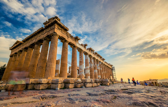Low angle perspective of columns of the Parthenon at sunset, Acropolis, Athens