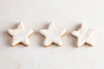 Batch of Star Shaped Gingerbread Cookies with White Icing