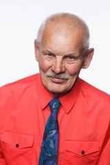 Portrait of a smiling old man over white background