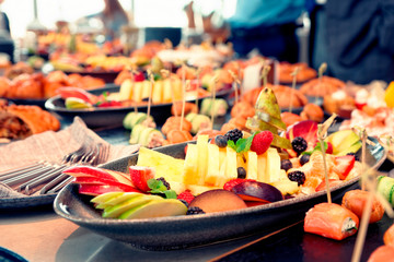 Cut fruits and another dishes, toned © Kondor83