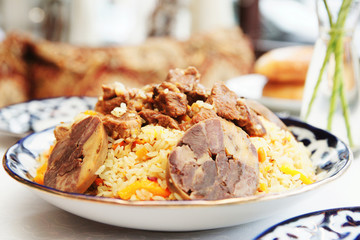 Traditional pilaf in plate, toned