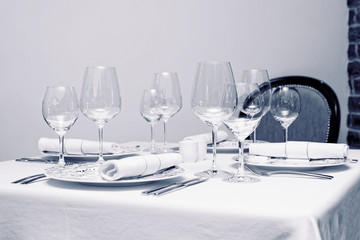 Place setting in a restaurant, toned