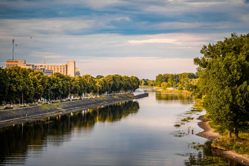 Silent city river reflection autumn landscape. River water panorama. River Pina in Pinsk city, Belarus.