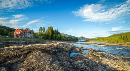 Panorama landscape on mountain river in summer scenery