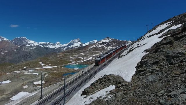 Overflying the Gornergratbahn train descending from the Gornergrat to Zermatt, Switzerland