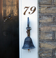 house number 79 with old fashioned bell