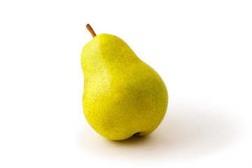 ripe yellow pear close up on white background with shadow