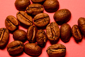 coffee beans on pink background