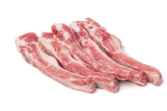 Sticky spare ribs on a white background with copy space.