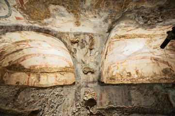 Ancient tombs dug in the tuff rock in the subsoil of Naples (Italy) called catacombs of San Gennaro.