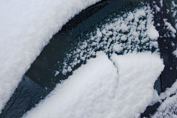 frozen car glass, car glass in ice with snow, frost, snowfall