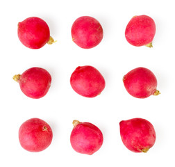 Radish lies on a white, isolated. The view from the top.