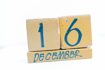 December 16th. Day 16 of month, calendar on wooden background. Handmade calendar