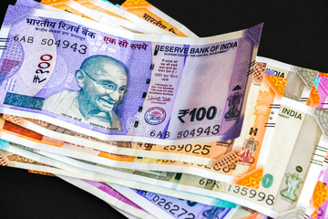 Close up view of brand new indian 50, 100, 200, 500, 2000 rupees banknotes.