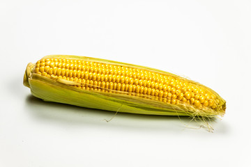 Corn isolated on white background, with shadow