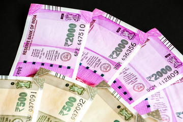 Close up view of brand new indian 500, 2000 rupees banknotes.