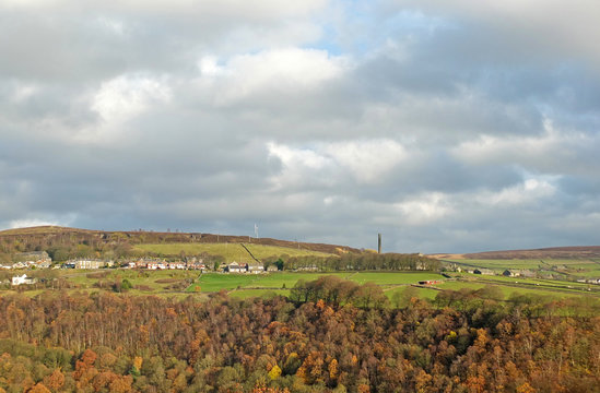panoramic view of the wadworth and chiserley villages of calderdale in west yorkshire with autumn pennine landscape with fields and farms with midgley moor in the distance