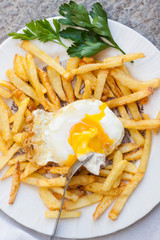 Fried eggs and fries