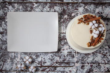 Beautiful white cake, decorated by a pastry designer.