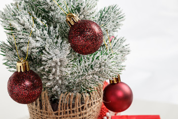 Christmas tree gift boxes with toys on a white background