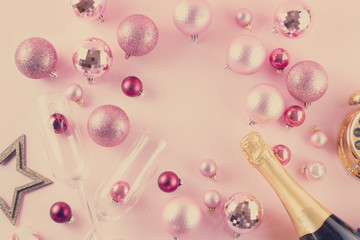 Christmas party with champagne, frame on pink background, retro toned