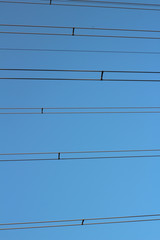 Electric wires and blue sky