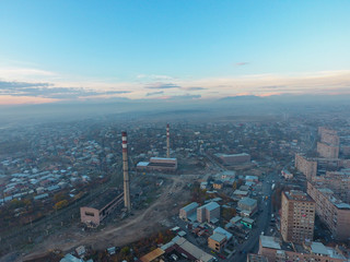 Arial view of Yerevan city buildings under blue sky, Armenia