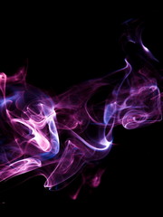 Purple smoke on black background