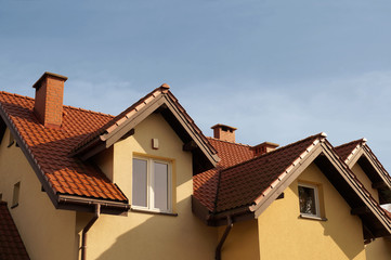 A newly built residential house, a roof made of ceramic tiles.