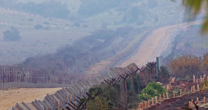 Border fence between Israel and Lebanon. barbed wire and electronic fence.