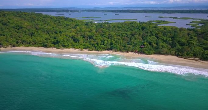 Flying over a tropical caribbean beach in Bocas del Toro, Panama