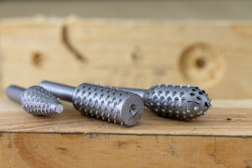 Countersink used in joinery for reaming holes. Joinery accessories on a workshop table.