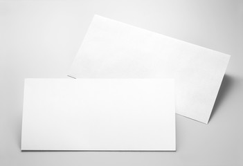 Blank stationery: folded letterhead and envelope 
