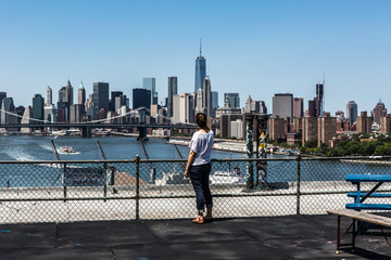 Girl Watching New York Sky line