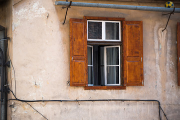 Fototapeta na wymiar Shuttered window